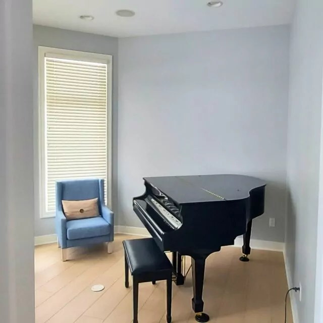 When it comes to showcasing a grand piano, the room should truly make it shine! 🎹✨ At New Look Painting, we understand the importance of creating a space that complements and elevates such a majestic instrument. Take a glimpse at the picture of our recent project, where we refreshed a room to highlight the grand piano as the focal point. With our expertise in color selection and attention to detail, we ensure that every corner of the room harmonizes to accentuate the beauty of the piano. Trust us to transform your space into a masterpiece.